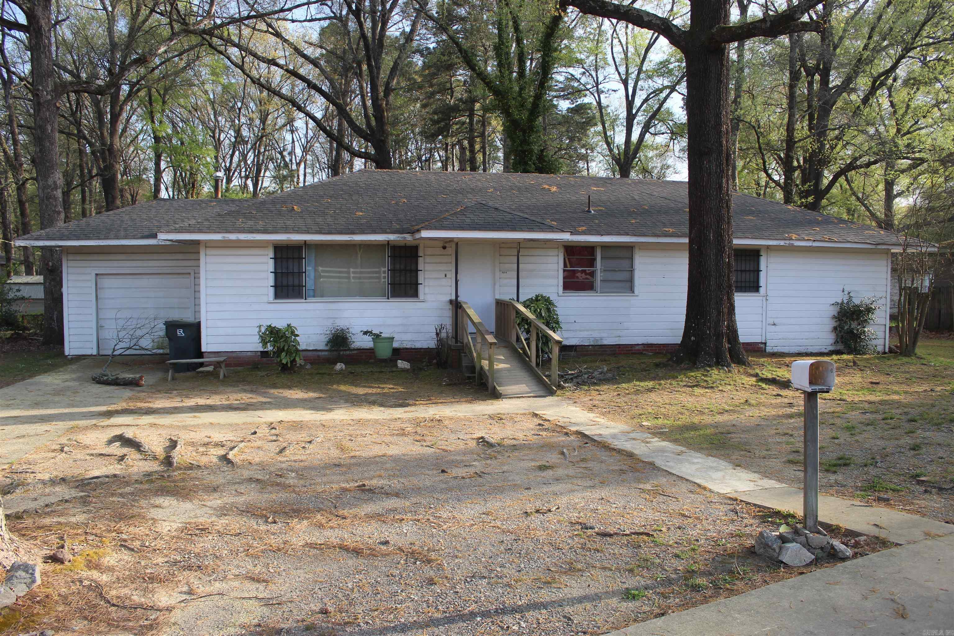 You will get the best of both worlds when it comes to this home. Although considered a residential property, it can be converted to commercial property as well. This front street property, formerly operated as a veterinarian clinic and adult daycare, was recently utilized as a rental, which means an instant income builder. Newly remodeled with an updated AC system, this home also has updated plumbing and electrical. Just a tad under an acre, you can definitely take advantage of the backyard space. Schedule a showing and come see for yourself.