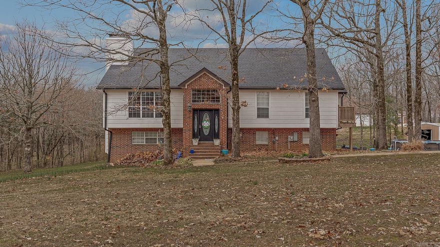 This  4-bedroom, 3-bath split-level home offers 3,340 sq ft that is perfectly situated on a 1-acre lot! Built with a brick and vinyl aesthetic, for a timeless, classic look. Inside, you’ll love the open floor plan that features vaulted ceilings and beautiful touches throughout with tons of natural light! Complete with two separate living spaces,  fireplace, and plenty of room to entertain, relax, or create the perfect work-from-home setup. Enjoy the  seamless flow between the living, dining, and kitchen areas . You will love the peaceful country living and generous indoor and outdoor space! This unique home has so many great features that every buyer can enjoy!!!