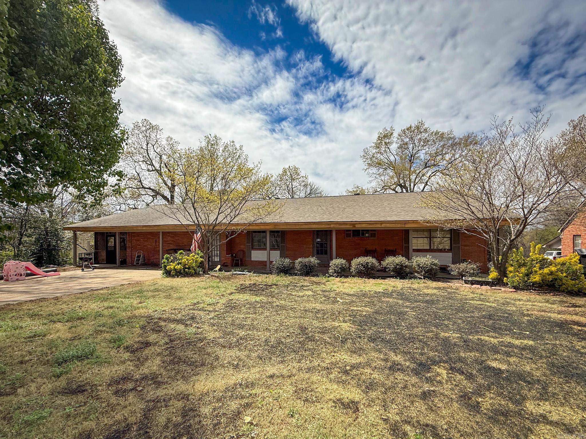 Welcome to your perfect retreat in the heart of Wynne! This cozy 3-bedroom, 2-bathroom home offers the best of both comfort and style, featuring a timeless midcentury modern aesthetic with warm wood tones throughout that create a welcoming, inviting atmosphere. The open and airy layout flows seamlessly, and the newly remodeled kitchen is a true highlight, blending modern updates with classic charm. The spacious bonus room/den offers versatile space that could easily be used as a 4th bedroom, office, etc., giving you plenty of options to fit your lifestyle. Step outside into your own private oasis with a pool, perfect for relaxing or entertaining on sunny days. The home is nestled in a quiet circle with only a few neighbors, offering peace and privacy, yet is still conveniently located near all the amenities you need in the heart of Wynne. Other standout features include a brand-new roof, a freshly installed fence, beautifully updated flooring and paint throughout, and a fantastic layout that makes this home feel like an escape from the everyday. Whether you're looking for a peaceful retreat or a home thatās perfect for entertaining, this gem has it all!
