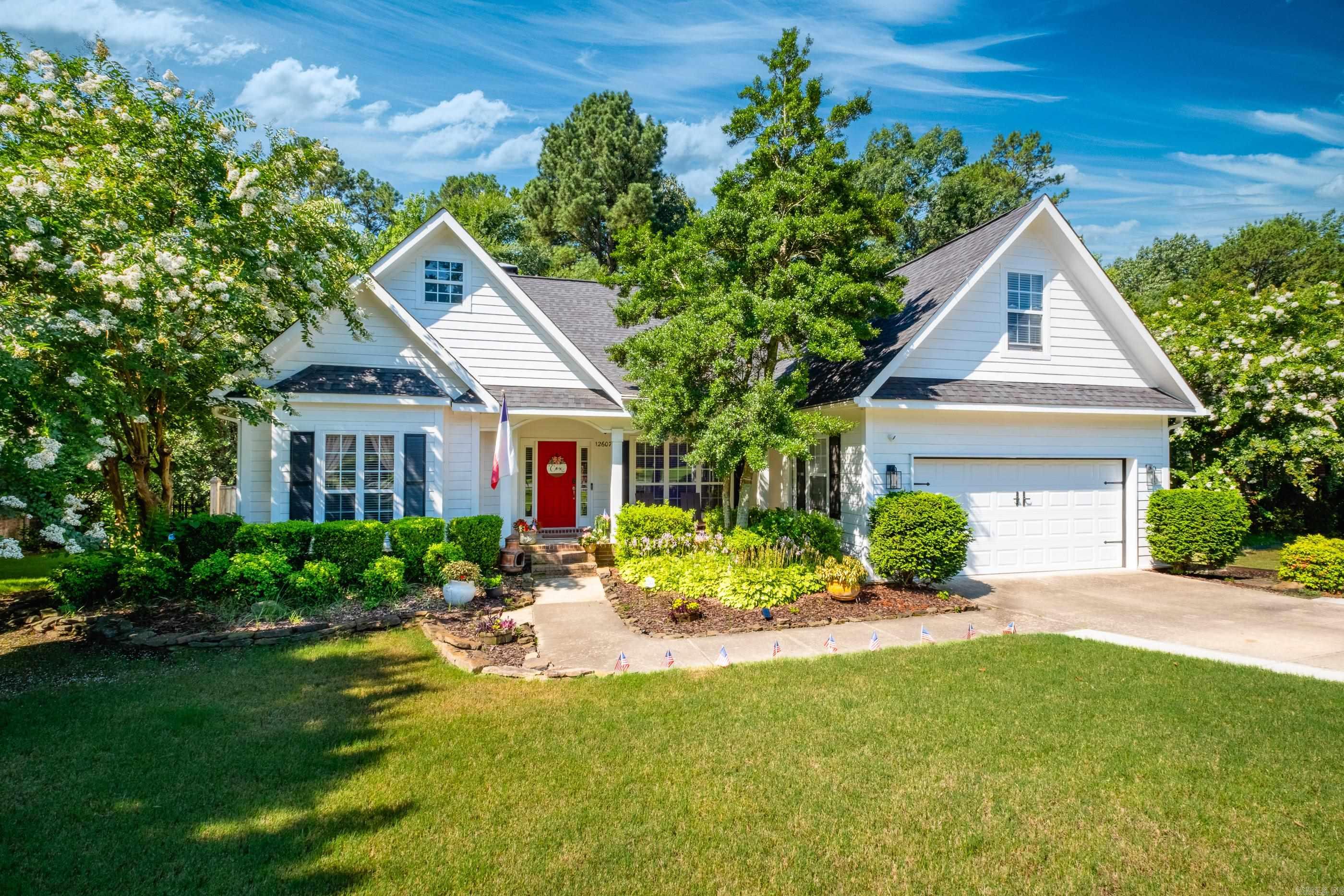 Don't miss this 1.5 story home surrounded by greenspace in Woodlands Edge. Cozy front porch and covered back private deck overlooking Brodie Creek. Three bedrooms on main level with dining room and eat in kitchen. Spacious living room with gas log fireplace and built ins. Laundry room with storage, coat closet and linen storage. New HVAC unit in 2024 and new carpet. Upstairs bonus room can be 4th bedroom with bathroom.