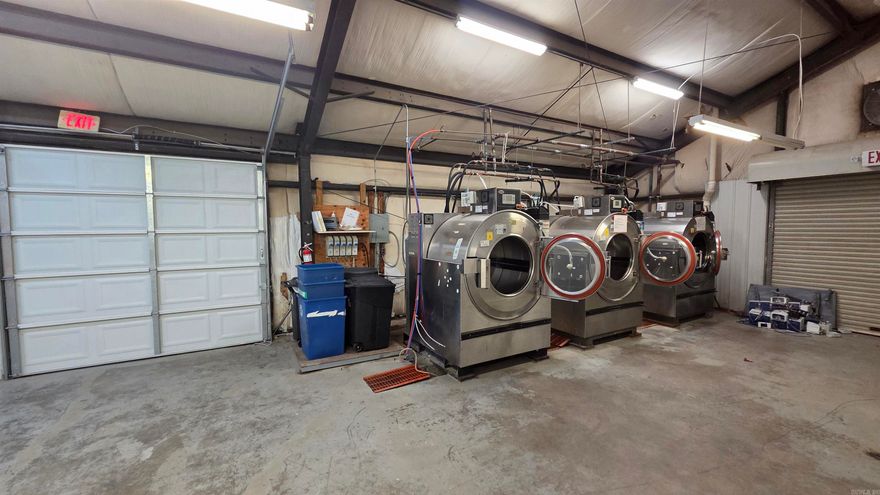 Welcome to market this aover 4300 sq ft heated and cooled commerical building!  Has 2 drive through roll up doors,  several offices and 1 kitchen space.  Has 3 commerical washers and 6 extra large commercial dryers that could be purchaed for an additional 25k!  Offers metal roof, parking for 10 plus cars,  easy access right off Dave Creek Parkway and much more!