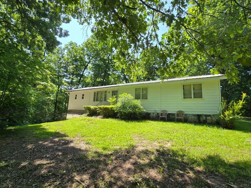 3-Bed, 2-Bath Ranch-Style Home in the Heart of the Ozarks  Welcome to this well-maintained 3-bedroom, 2-full bath ranch-style home, perfectly situated in the heart of the scenic Ozarks. This inviting property combines comfort, practicality, and a touch of rural charm—ideal for families, retirees, or those looking to enjoy the slower pace of country living.  The home features a spacious kitchen/dining combo, ideal for both everyday meals and entertaining. Inside, you'll find a tasteful mix of wood and tile flooring, central heat and air for year-round comfort, and a functional layout that fits a variety of lifestyles.  Recent updates include a new roof installed in 2023 and bathroom upgrades that enhance the home's appeal and functionality. The free-standing stove and refrigerator are included with the sale, adding even more value.  Outside, the durable metal and vinyl siding offers low-maintenance living, so you can spend more time enjoying the beautiful Ozarks surroundings.  Outdoor enthusiasts will love the location—just a short drive from the Eleven Point River, Spring River, and Black River, offering excellent opportunities for fishing, kayaking, and floating.  Don’t m