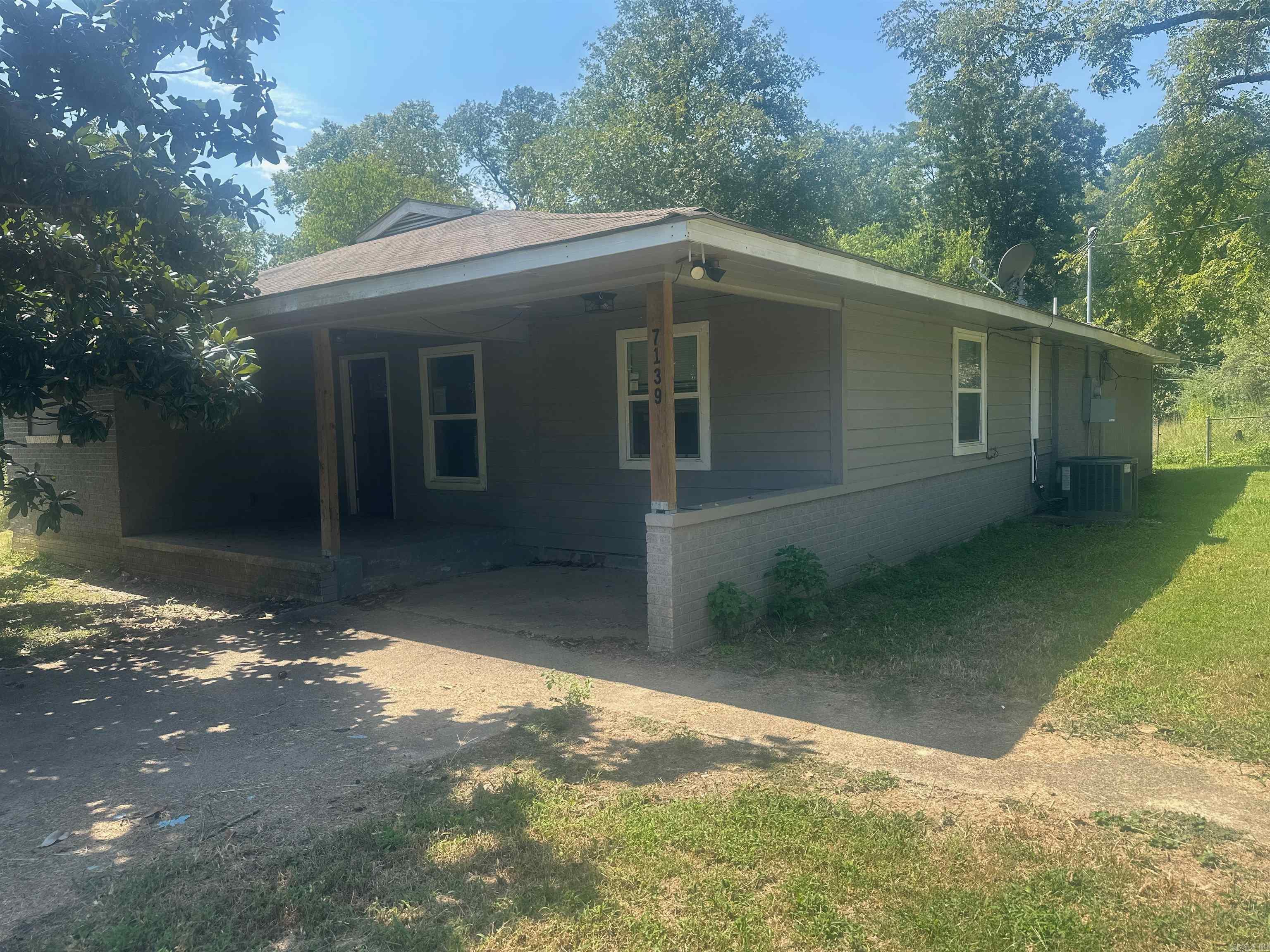 Discover this spacious 4 bedroom, 2 bath home sitting on 1.70 acres in Jessieville School District! Featuring approx. 1,600 sq ft of living space, this single-level ranch offers plenty of room with an open layout, large kitchen, and comfortable bedrooms. Recent updates include modern finishes, LVT flooring, fresh paint, and updated systems. The property also offers a fenced yard, shop building, and wide-open outdoor space with endless potential. Located just off Hwy 7 with paved road frontage, this home combines rural living with easy access to schools, shopping, and Hot Springs amenities.