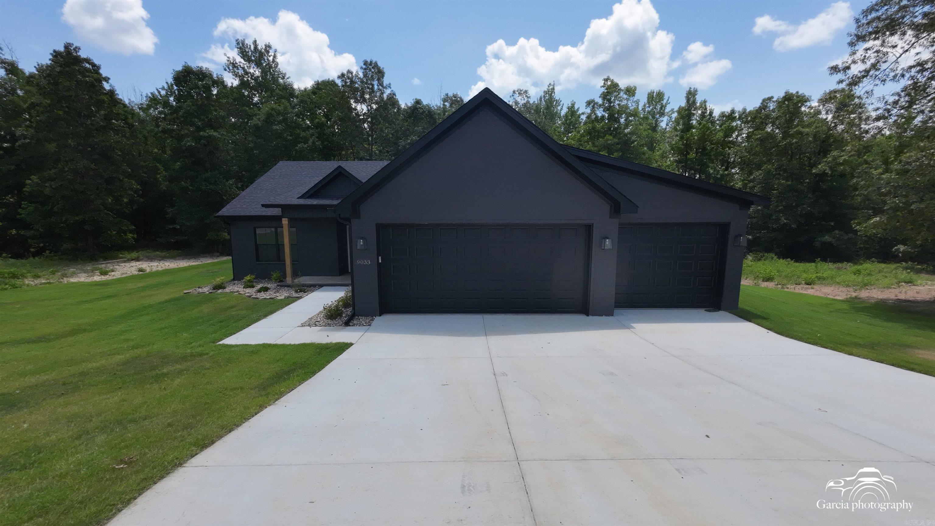 New Construction 3 bed 2 bath with office. All one level, 3 car garage House sits on over an acre! Open floor plan, covered porches and more!