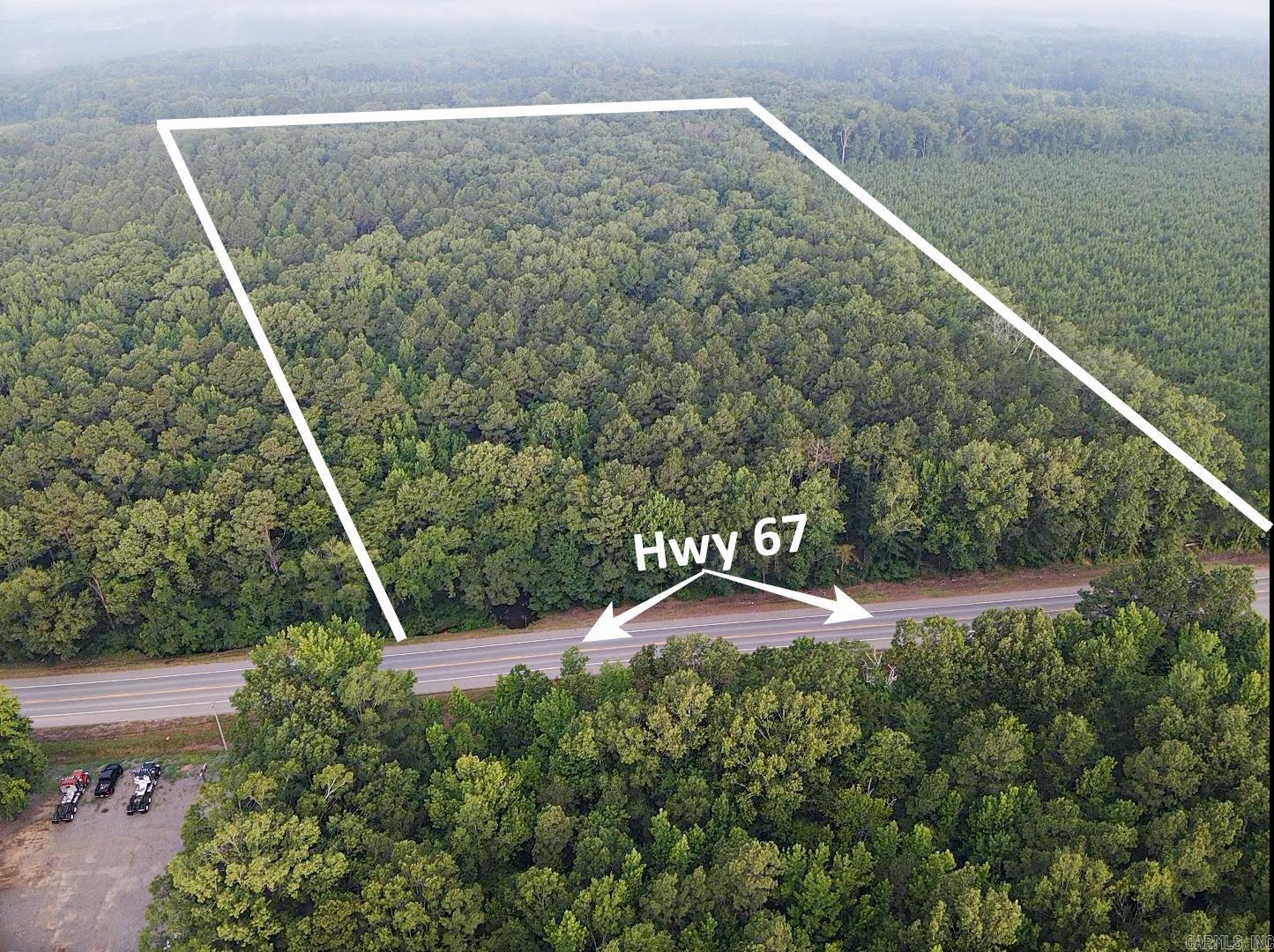 Great 3+ Acres on Hwy 67 Frontage. Timber on property. No utilities on site possible access at the road.