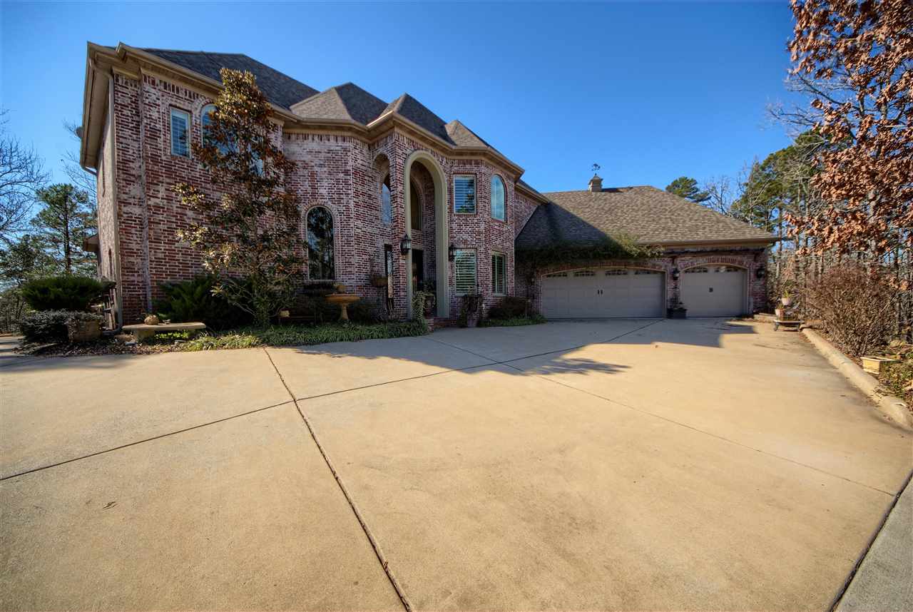 Incredibly stunning custom estate nestled into 5 private acres in the gated community of The Estates at McHenry Creek. Over 4000 sq ft of perfection w/soaring ceilings, an open concept, chef's kitchen w/massive granite island, stainless appliances and large pantry. Master suite w/private access to the pool & entertainment spaces, his/her closets (closet is also a safe room), jetted tub & separate shower. Upstairs find 3 bedrooms, 2 baths and a second living area with access to the balcony. It's a Must See!