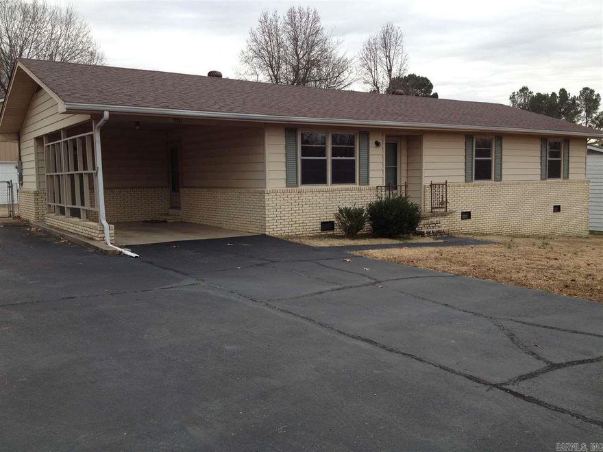 Nice brick home close to shopping and schools. Furnished appliances include refrigerator, electric solid surface cooktop, self cleaning built in oven, dishwasher, washer and dryer. Attached carport has storage room.  Asphalt parking pad extends along the side of the house to detached garage with bonus room upstairs inside the fenced backyard. Covered patio in the back. No pets allowed. Not HUD Section 8 rental. Application required. Application fee charged. Contact Property Manager.