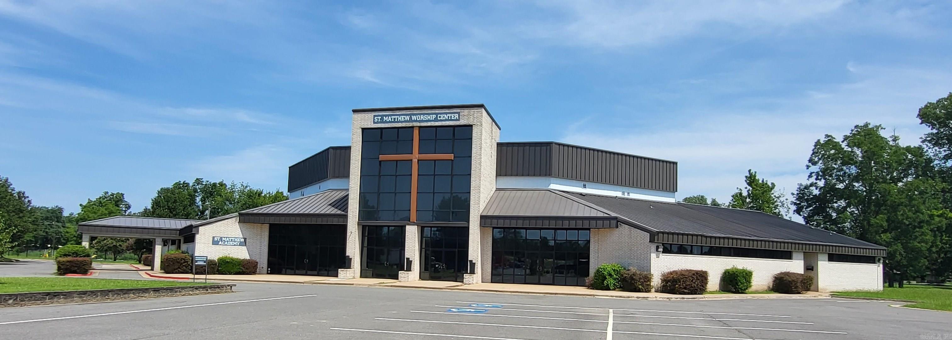 Beautiful 19,671 +/- sf building on 5.01+/- acres near LR River Port. Visible from 440, this spacious, elegant building has sanctuary for 300+ classrooms, commercial kitchen, fellowship hall, offices, pastor's study, and a 6,112+/- square foot activity center/educational facility to be finished out by the new owner. Paved parking w 150 spaces, and green space for additional construction. New roof and extensive interior remodel in 2023! Building is leased to a tenant on a 5-year term, making this an excellent investment opportunity! See brochure in docs. Selling as-is. Agents see remarks.