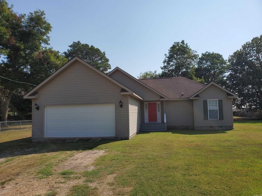 Welcome to this inviting 3-bedroom, 2-bath home offering 1,376 sq. ft. of comfortable living space on a 0.32-acre lot. Nestled in a quiet neighborhood, this property combines small-town charm with modern convenience.  Inside, you’ll find a bright and open layout with plenty of room for entertaining or relaxing. The kitchen offers ample cabinet space, while the bedrooms are generously sized with great natural light. The two full bathrooms provide both functionality and style.  Step outside to enjoy the large yard—perfect for gardening, outdoor gatherings, or simply relaxing under the Arkansas sky. With nearly a third of an acre, there’s room to expand or add personal touches.  Located in Rector, this home is just minutes from local schools, parks, and shops, making it an excellent option for families, first-time buyers, or anyone seeking a peaceful lifestyle.   Address: 1021 S Stewart St, Rector, AR 72461