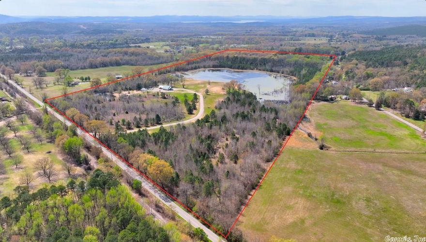 This beautiful land is off Highway 300. It is approximately 9 miles from Hwy 10 and Chenal Parkway. This Property has Both Cleared and Wooded Areas and Includes 2 Ponds and a Morgan Barn that has been turned into a barndominium. The barndominium is 3 bedroom and 2 full baths. it is 2500 square feet and so beautiful. There is a a home pad that has been built for a large home, overlooking the large pond. There is a septic system that could service multiple homes or a large house. This Land is Ideal for Your Own Private Estate or Residential Development. Wildlife and Peace and Quite are Abundant.