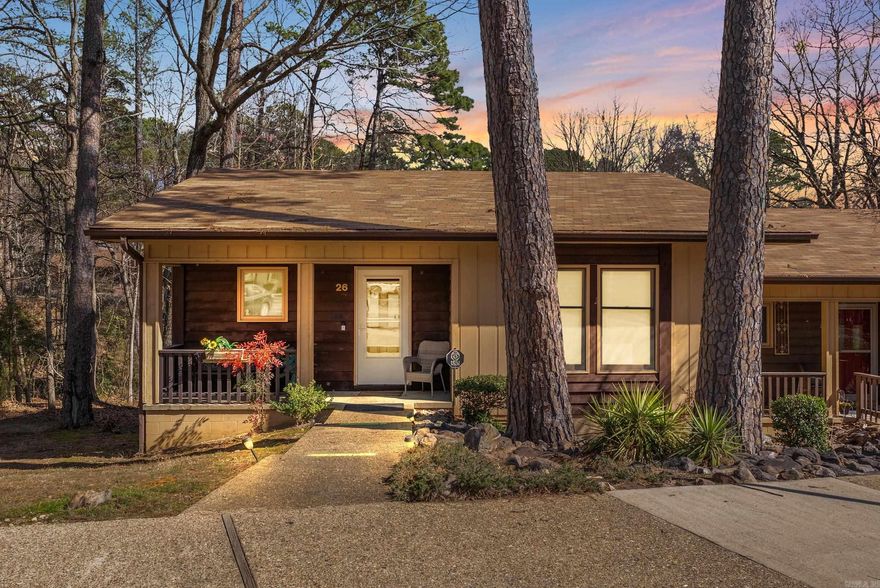 Welcome to 26 Tomisa Lane, located in the picturesque Hot Springs Village! The seller offering to cover the $2,000 Village buy-in fee, as well as the option to buy this townhome fully furnished! This charming end-unit townhouse features 2 bedrooms, 2 bathrooms, and an open, one-story layout ideal for easy living, as well as a back patio that offers a great place to unwind and relax. Built in 1984, the home has been carefully maintained and updated, offering modern comforts while still leaving room for you to personalize the space to your taste. Recent updates include a new roof (installed in 2023), a stylish modern kitchen faucet, a new Kenmore Elite refrigerator, new cabinet pulls throughout, and all necessary repairs have been completed. With these updates already taken care of, you can move in and immediately begin enjoying the relaxed lifestyle of Hot Springs Village. Just 5-6 blocks from Lake DeSoto, DeSoto trails, the golf course, fire and police stations, restaurants, gas stations, and more. Schedule a showing today and start imagining yourself taking advantage of The Village and all it has to offer!