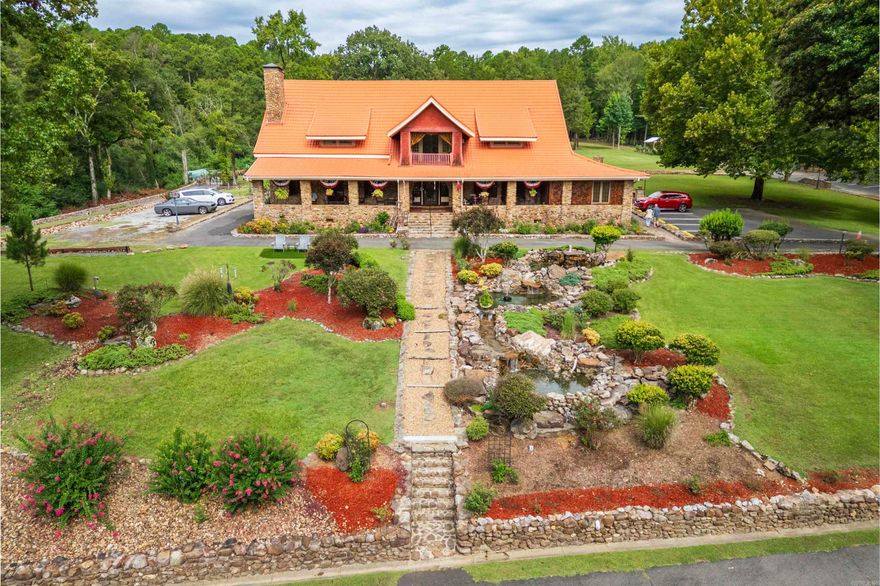 Don't miss the chance to own this Prime Hospitality Bed and Breakfast a 1910 Craftsman manor home completely restored to classic elegance in 2005,with many new updates in 2024. Situated on a 5,5 acre estate which borders Hot Springs National Park in the Foothills of the Ouachita National Forest, and Home to Oaklawn Horse Racing, where tourism thrives.  This Boutique Bed & Breakfast offers five deluxe suites. Flat screen TV's with YouTube TV,  WIFI and DVD movie library.   Spa tubs, fireplaces, 1000 thread count sheets, fluffy robes and more.  The Five acres offers over 5 acres to explore, gardens, swings and hammocks, fire pits and firewood stone fireplace and patio with patio lights for tranquility and relaxing.  Business opportunity to host weddings up to 100 people.  Honeymoons! Family Reunions, Retreats, Weekend Escapes, Adventure, Romantic Getaways, Birthdays, Road Trips and more!