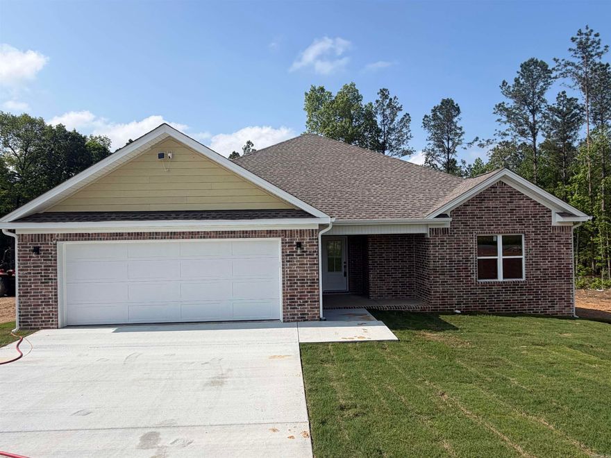 Welcome to this charming 3 bedroom, 2 bathroom home situated on 2.28 acres that offers privacy and a peaceful wooded backdrop. This home features an open, split floor plan designed for both comfort and functionality. The spacious suite is a true retreat, complete with a soaking tub, walk-in shower, dual vanities, and separate his and her closets. The kitchen offers a convenient pantry, gas stove and flows seamlessly into the living room- perfect for entertaining. Don't miss your chance with this home!! Schedule your showing today!!