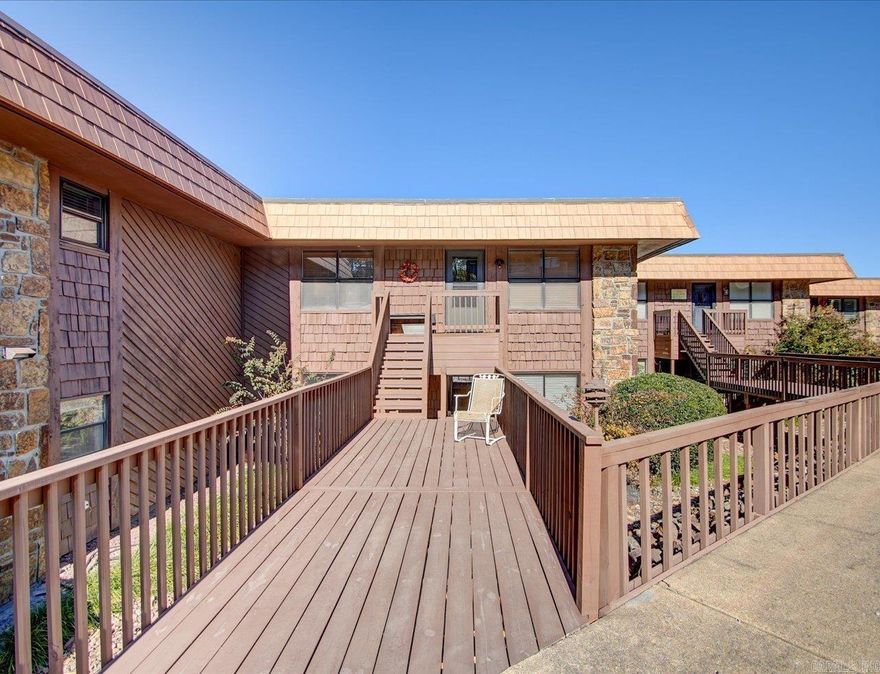 Welcome to this stunning lakefront condo with lovely views.  The spacious open living area offers an abundance of natural lighting and features a rock fireplace. Step out onto your private covered patio. You are only steps from the lake and your private boat slip.  The Harbor offers a swimming pool, picnic area, lakeside boardwalk and swim dock.  The grounds are well maintained and offer a gated entrance. Don't miss this opportunity to own this serene property.  Furnishings are negotiable.  Three month minimum on rentals.