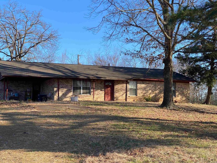 Brick house with approx 1,400 sq ft of living space situated on approx 25.75 acres.