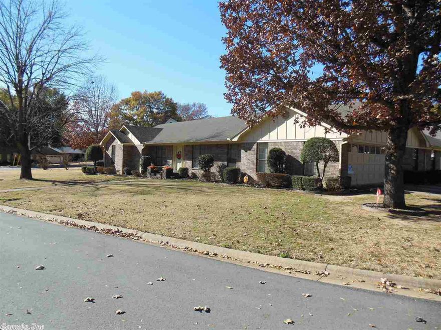 Custom built One owner home  located in a well established subdivision and on large corner lot! Features include a three car garage, level lot, large bonus room with bath, fireplace, oversized master bedroom suite, spacious kitchen, breakfast area, as well as formal dining room all this and hardwood floors! Beautifully landscaped yard and large patio area overlooking private back lawn. Dont miss seeing this rare opportunity.