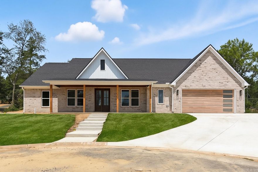 Located just minutes from Lakeside Schools, this beautiful 3-bedroom, 2.5-bathroom home with an office blends quality craftsmanship with timeless style. From the moment you arrive, the classic brick exterior and charming covered front porch create an inviting first impression. Step inside to discover a show-stopping interior featuring an open, split floor plan with elegant tray ceilings, abundant natural light, and stylish finishes throughout. The kitchen is a chef’s dream, highlighted by sleek quartz countertops, a spacious walk-in pantry, and custom cabinetry – perfect for hosting and everyday living. The primary suite is your own private retreat with a spa-like ensuite bath, oversized walk-in shower, and a generous walk-in closet. Thoughtful extras include a large laundry room with bonus storage, a covered back patio for relaxing evenings, and modern touches that make this home stand out. Don’t miss this opportunity to own new construction in one of Hot Springs’ most sought-after neighborhoods. Schedule your private showing today and make 248 Cromwell your forever home!