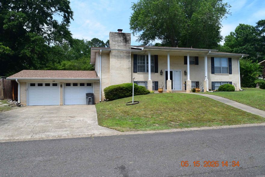 Located in the Village South Subdivision, this 5-bedroom, 3-bath home offers approximately 2,752+/- square feet of living space with a functional and versatile layout. The main level features 2 bedrooms and 2 bathrooms, while the lower level includes 3 bedrooms and 1 bathroom. Additional features include a separate dining room, dedicated laundry room, fireplace in the living area, two-car garage, and paved driveway. With spacious living areas and a flexible floor plan, this property offers a variety of options to suit your needs. Schedule your showing today!