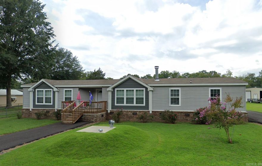 Welcome to your new home! This inviting 3-bedroom, 2-bath mobile home offers comfort & convenience in a tranquil setting. Step inside to find an open-concept living space w/ a bright & airy feel. The well-appointed kitchen features modern appliances with new dishwasher & microwave, ample cabinet space, & an island that is perfect for casual meals.  Spacious 3 bedrooms with walk in closets & 2 baths are a perfect size for a family. Step outside and discover the standout feature of this property—a massive 50x40 shop with a full bath & concrete floor which is ideal for hobbyists, entrepreneurs, or anyone in need of extra storage not mention the extra 10 ft of storage on each side. The shop offers a versatile space that can accommodate a wide range of activities, from woodworking & car maintenance to crafting and more.   Additional highlights include a well-maintained yard and storm cellar a peaceful neighborhood, and easy access to Cow Shoals on the Little Red River. This property offers a perfect blend of comfortable living & functional workspace, making it a fantastic choice for those seeking both home and hobby space. Don’t miss out on this unique opportunity—schedule a tour today!