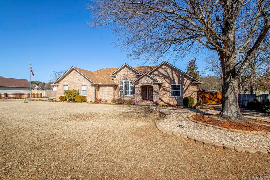 What an incredible property with beautiful street appeal and 24x24 detached finished 2 car garage/workshop/mancave as well as 2 car side-load garage! Desiring a one level all brick home that is immaculate? - then your search stops here! Fabulous great room with vaulted ceiling and gas fireplace with blower. Spacious owner suite also has vaulted ceiling, whirlpool tub, separate shower & walk-in closet. Wonderful dining room with tall ceilings and gorgeous windows! Split bedroom plan allows privacy from owner suite. Architectural roof '21 includes gutter guards, double hung windows with lifetime warranty, SS dishwasher '22, SS microwave '23, hot water tank '24, house h/a unit 5 years old, lighted switches, exterior downlighting, 50 amp plug for RV on its own breaker and tons of parking.  Enjoy coffee on the back deck looking on the level yard with gazebo - fully fenced. Sprinkler system front & sides. Detached garage has heat/air unit, approx. 25 years old, been used less than a dozen times, is not functioning and is not warranted by seller. Oh, what a fabulous place to start making wonderful memories in!