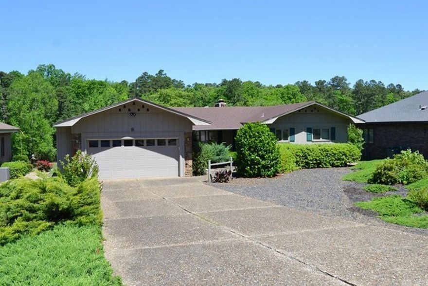 DeSoto golf course home with screen porch overlooking the course. Home has 2 bedrooms and 2 full bathrooms, 2-car garage and wood burning fireplace.