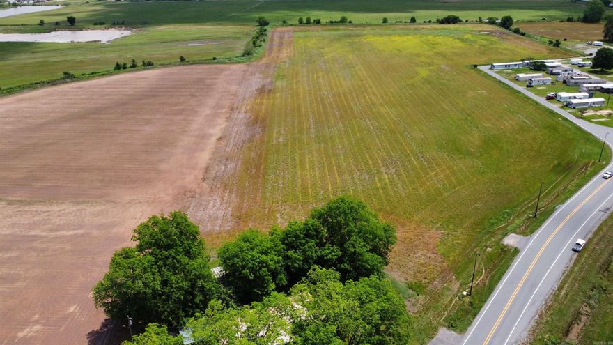 Presenting an extraordinary opportunity, this 11.4-acre parcel of vacant flat land is brimming with untapped potential. Located adjacent to the renowned Saracen Casino, the possibilities are endless. Previously utilized for farming purposes, this versatile plot now beckons entrepreneurs, visionaries, and developers alike, offering a blank canvas awaiting transformation into something remarkable. Situated at the intersection of I530 and Highway 65, the location is nothing short of ideal, boasting exceptional accessibility and visibility. Whether it's commercial ventures, residential development, or recreational projects, this expansive land is ready to accommodate and bring dreams to life. Seize this rare chance to shape the future of this promising space and unlock its unlimited possibilities.