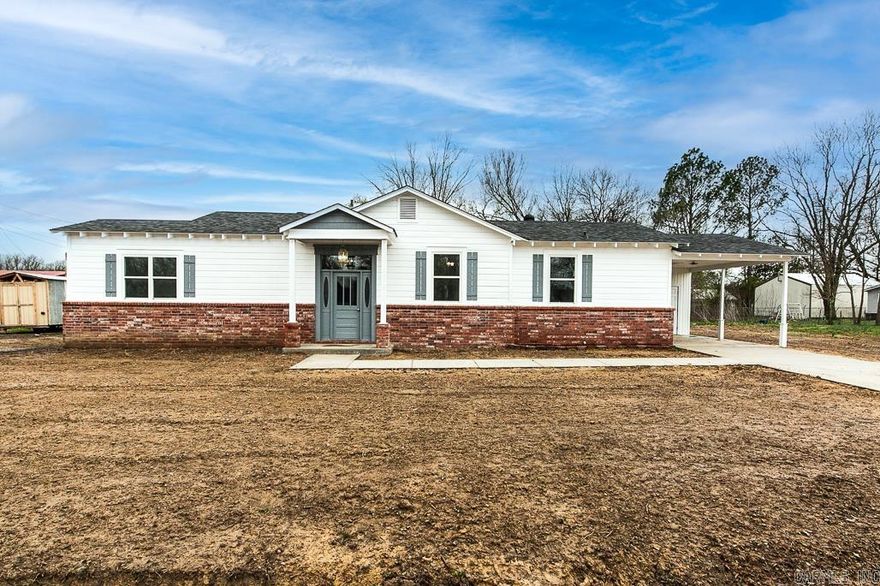 You do not want to miss out of this one of a kind home with so many intricate details!  Just through the front door, you will love the open concept with the large and welcoming kitchen that opens to the entry and living space.  The kitchen is equipped with new stainless steel appliances, custom cabinets featuring glass from the original windows of the home, beautiful butcher block countertops, and custom tile backsplash.  The master bathroom also features stunning tile work in the walk in shower.  You will enjoy peace of mind living here with all of the new features including architectural shingle roof, engineered hardwood floors, carpet, ceiling fans, plumbing, electrical, water heater, and even new windows!  It is like the gift that just keeps giving!  Call listing agent for more details and schedule your showing today!
