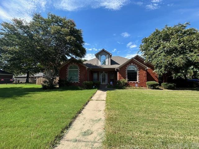 Charming Brick Home in Sought-After Catherine Place Subdivision! Welcome to this beautifully maintained all-brick home situated on a spacious corner lot. Recent upgrades include a new HVAC system, newer roof, energy-efficient windows, and new dishwasher and stove. The inviting living room features a vaulted ceiling and a cozy gas log fireplace, creating a warm and open atmosphere. A bonus sunroom/office offers flexible space ideal for working from home or relaxing with a view of the backyard. Step outside to enjoy the brand-new screened-in gazebo, perfect for entertaining or quiet evenings outdoors. This home combines comfort, quality, and style in the desirable Catherine Place Subdivision!