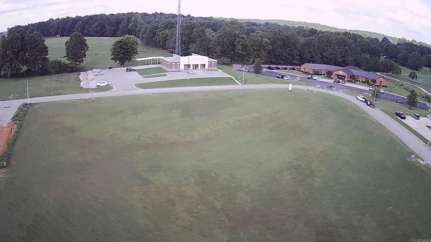 Large corner lot ready for your office or business investment.