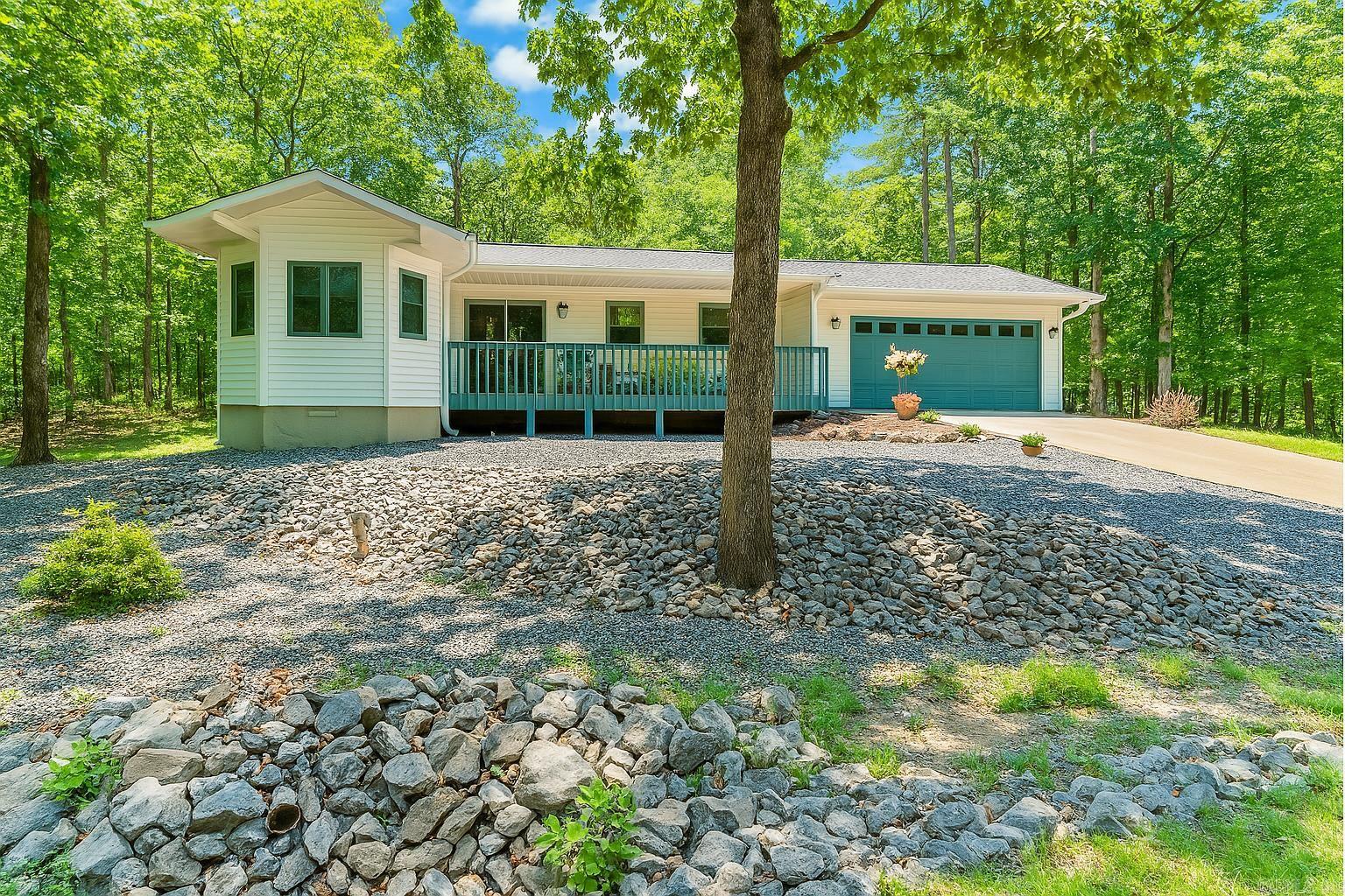 Comfort and Convenience in one of Hot Springs Villageās most desirable areas just minutes to 2 card gates! This 3-bedroom home offers effortless living inside and out. The front porch is perfect for morning coffee and there is a 4 season heated and cooled sunroom, complete with its own heat/air source. Spacious laundry room, volume ceilings, no carpet, easy maintenance landscaping! Step outside into your fully fenced backyardāideal for pets, gardening, or entertaining under the Arkansas sky. Located in the scenic Balboa Golf Course neighborhood, youāre surrounded by recreational opportunities, with golf, nature trails, and more just moments from your doorstep. Beautifully maintained home with a new Roof 2022, new water heater 2025, back yard fence 2023.