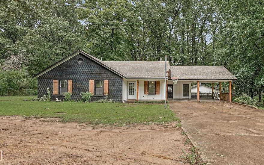 Newly updated 4 bedroom 2 bath home sits on 1.09 acres giving you a country feel just minutes from downtown. The primary suite is perfect with its large closet space and private bath. The outside has been updated in the popular black brick and contrasting white style with real wood accents including a new wooden deck. The large backyard provides plenty of room for entertaining or outdoor activities. There is a shop with a rollup door in the back for the person of the house who loves projects.