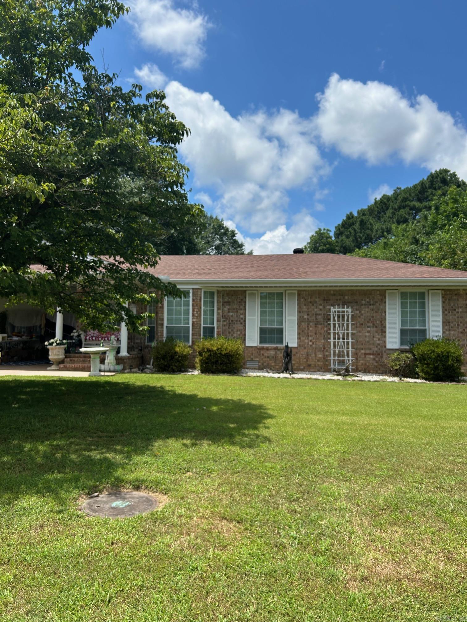 Excellent well maintained home, clean as a can be. Lovely yard for enjoying, with a shop and storage, fenced yard, open style floorplan between living room and dining room, sep laundry, full brick home, low maintenance exterior. This home has been loved....AGENTS SEE REMARKS