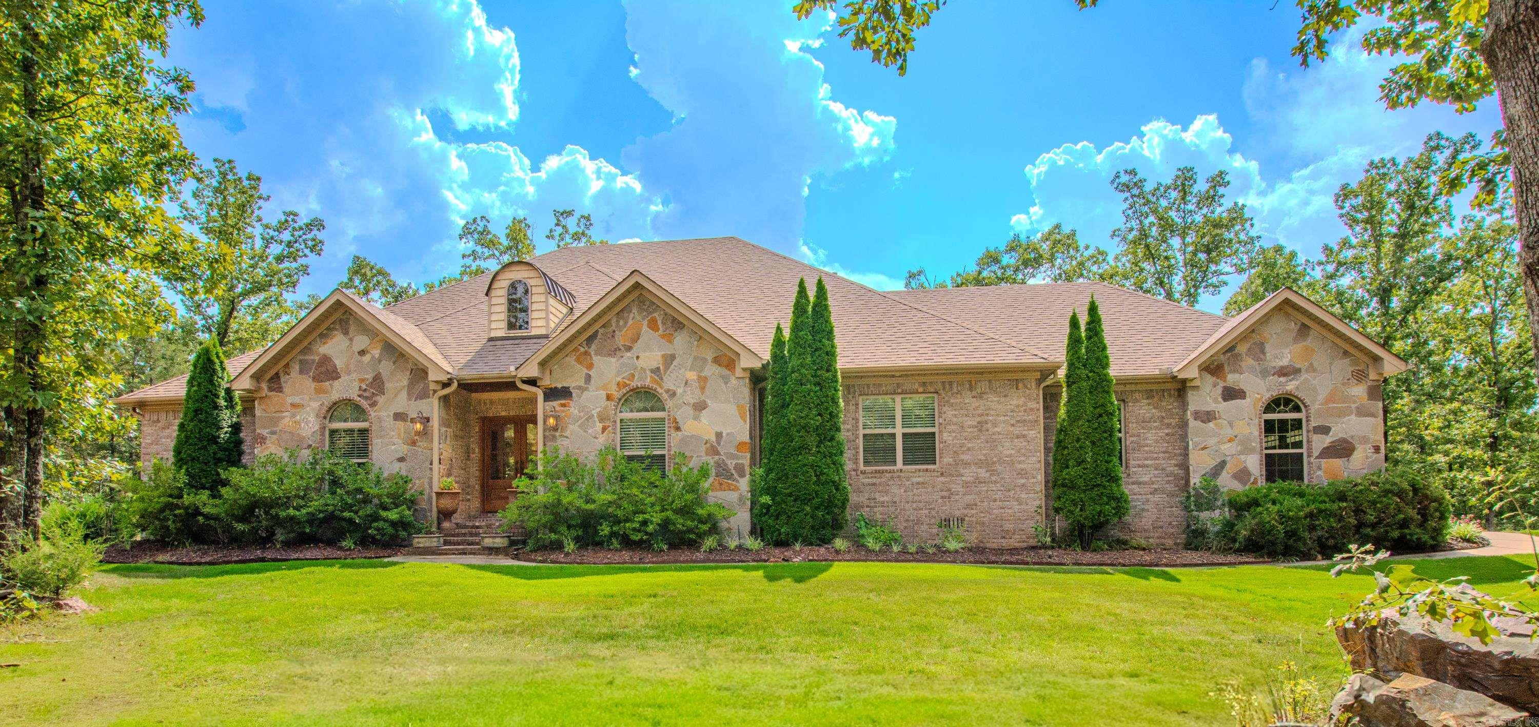Welcome to this stunning custom-built home set on over 5 acres of serene land, offering both privacy and space. Designed with comfort and function in mind, this residence features 4 spacious bedrooms, including a luxurious primary suite with a private sunroom—perfect for relaxing with morning coffee or unwinding at the end of the day. The gourmet kitchen is a chef’s dream, complete with a commercial-grade oven with built in spice rack and ample prep space, making it ideal for both everyday meals and entertaining. Throughout the home, you’ll find beautiful wood ceilings that add warmth, character, and timeless charm. With its thoughtful design, quality craftsmanship, and expansive grounds, this property is a rare find that blends modern living with natural beauty.