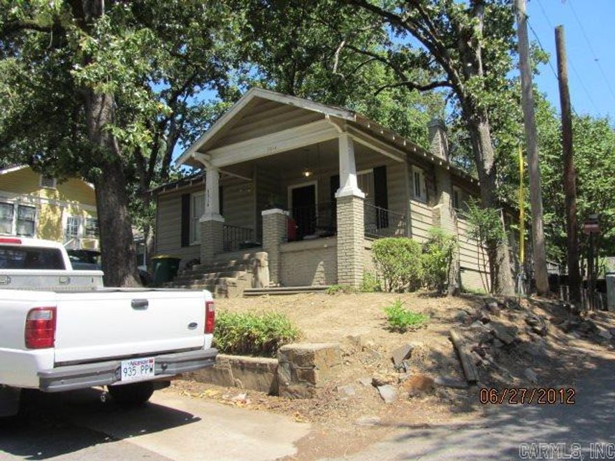 Home has beautiful hardwood floors, ceiling fans, deck on rear of house, fenced back yard.