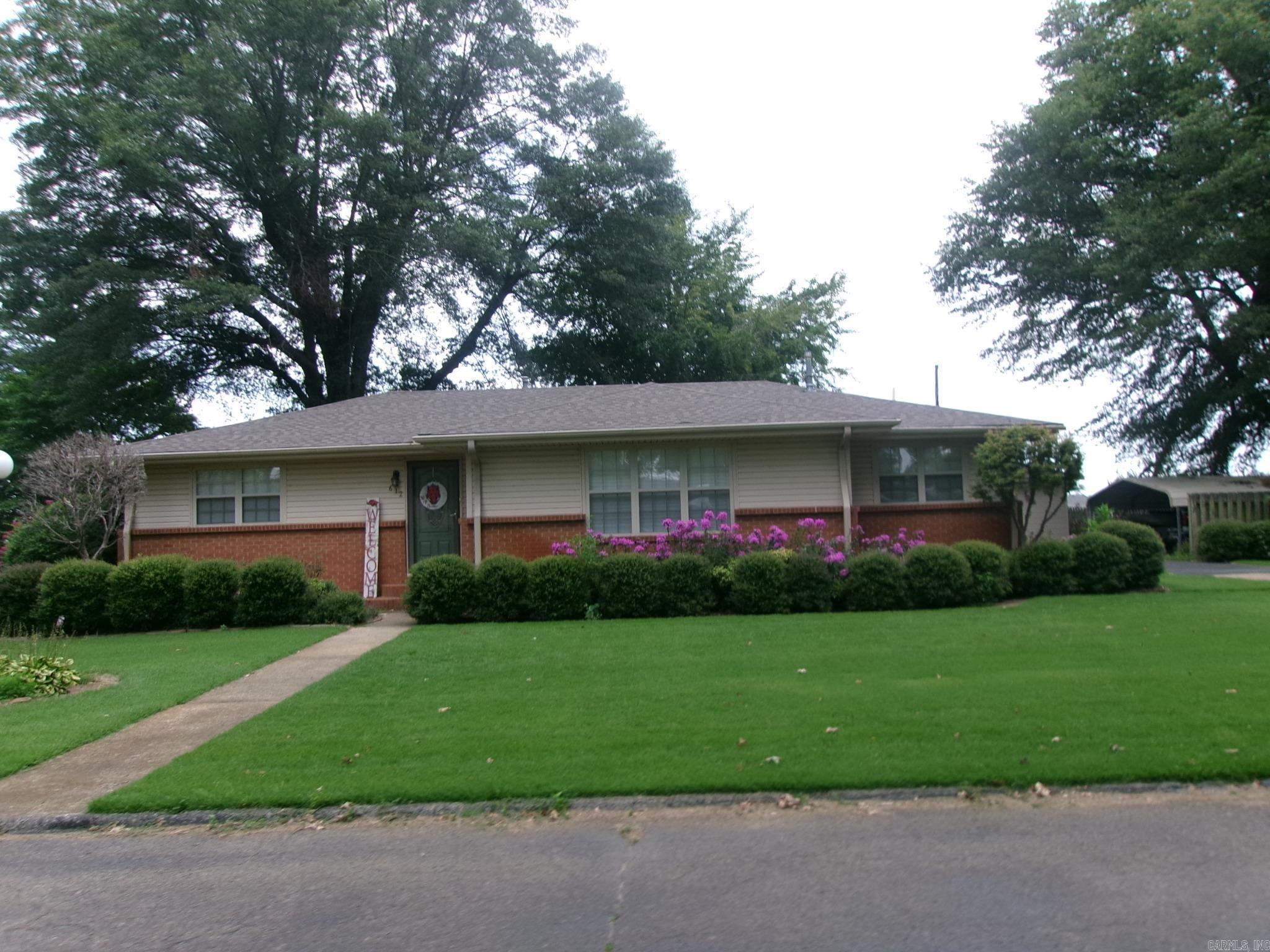 Nice 3 bedroom 1.5 baths with shop on a nice landscaped lot.