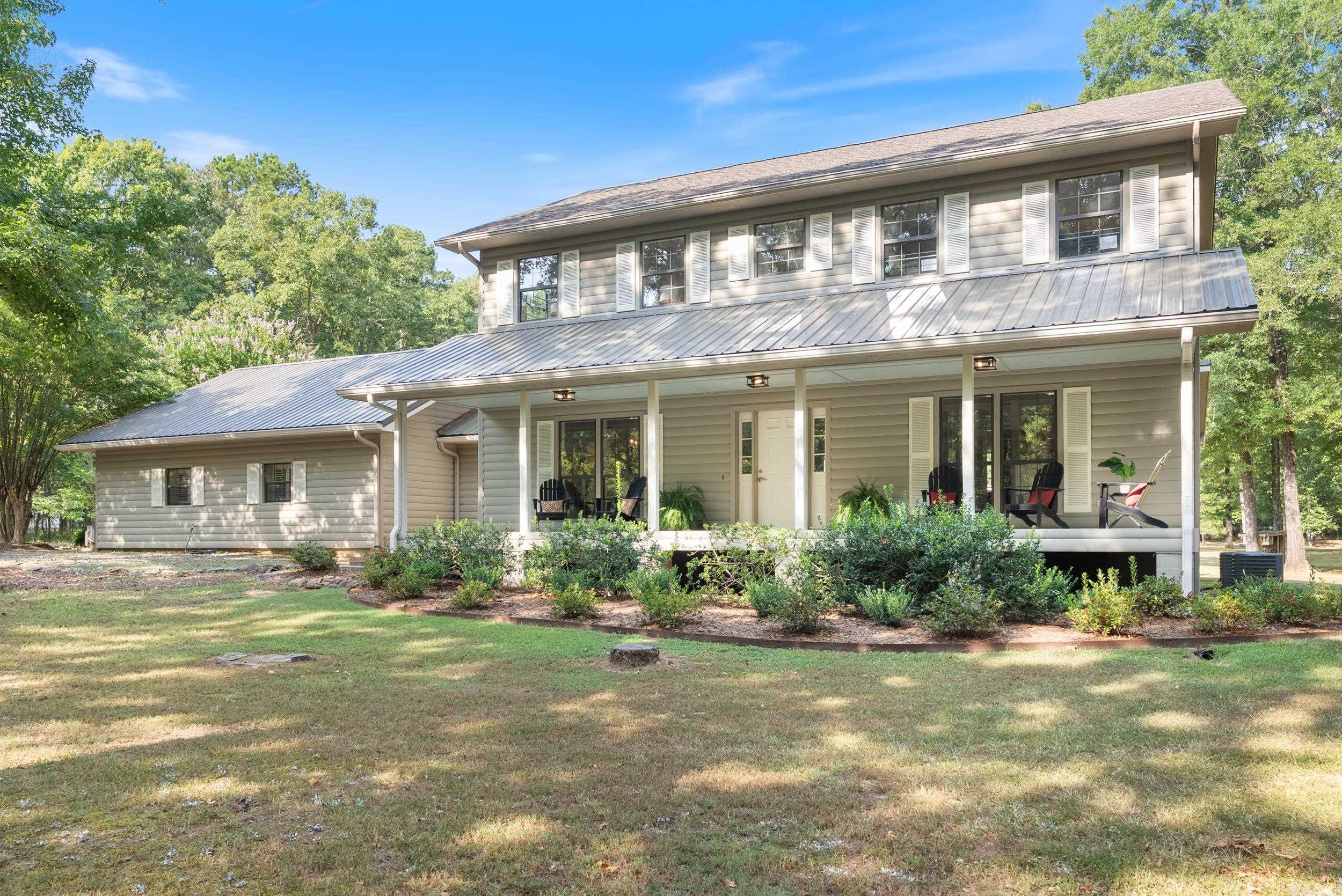 A Rare Find: Level 5-Acre Estate with Pond, MIL Quarters, Shop & More Just 10 Miles from Town! Welcome to your dream retreat! Situated on 5 flat, usable acres with a peaceful pond, this one-of-a-kind property offers a perfect mix of comfort, functionality, and privacy. The home features 5 spacious bedrooms and 3.5 bathrooms with an open floor plan ideal for modern living and entertaining. All new interior paint and brand-new carpet give the home a fresh, move-in-ready feel, while custom built-ins and a large walk-in pantry with handcrafted cabinetry add style and convenience. Even betterā2 brand-new HVAC systems with a 10-year warranty ensure comfort and peace of mind for years to come. One of the standout features is the attached 900 sq ft MIL quarters with a full kitchen, perfect for extended family or guests. For hobbyists or anyone needing extra space, the property features a 2-car garage/shop, a separate storage building, and ample storage in two attics plus additional space beneath the home and a dedicated storm shelter. This updated and versatile estate is near Pinnacle Mountain, Moss Mountain, Leivaās Coffee & BoBrooks Farms-yet just minutes from Little Rock!