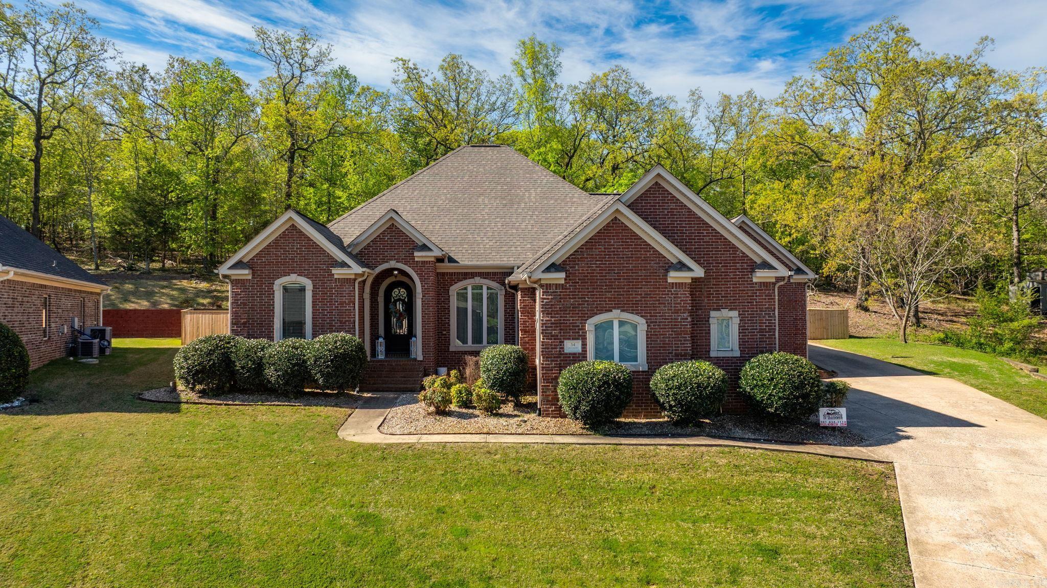 Looking for a new house for your family? This one is it! Step into the beautiful and luxurious 34 Cypress Creek Drive, located in the highly desirable Greystone Subdivision. This home is nestled on a great lot and truly has it ALL! Whether you like to golf, or just prefer to be a few minutes from town in a great subdivision, check this one out! It features 4 bedrooms, 3 bathrooms, double living area, huge master bed and bath, jacuzzi tub in the master, walk in closet, gas fireplace, double oven in kitchen, covered back porch with a private backyard that backs up to trees, TONS of storage/closet space, and much more. You really have to see this one in person to fully appreciate its beauty!! Schedule your showing today, it won't last long!