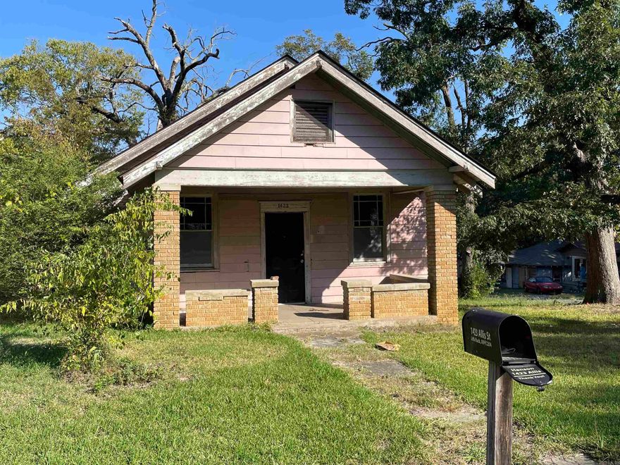 Are you looking for a great remodel opportunity?  This charming home just might be the one.  Sitting on a corner lot, the home includes off street parking with a covered carport. There is a bonus room in addition to the two bedrooms. Most of the interior has been repainted and new door fixtures and ceiling lights are installed. The cabinets and vinyl plank flooring are partially completed.  The roof was replaced in 2017 and the termite policy has been active since 2017.    Sold 'as-is'