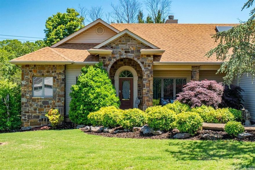 Step inside to this charming home on a cul-de-sac located near the East Gate of Hot Springs Village.   The split floor plan has an open living area with plenty of windows and natural light. The kitchen is light and airy with a breakfast nook area overlooking the back deck, perfect for grilling.  The private primary suite offers a large bedroom, plenty of closet space, a large bathroom with shower and separate jetted tub.   2 additional bedrooms and bathroom plus laundry room complete the floorplan.   New roof in 2024. The front yard is grass and has beautiful flower bed landscape including a Japanese Maple tree.    Schedule your private showing today.