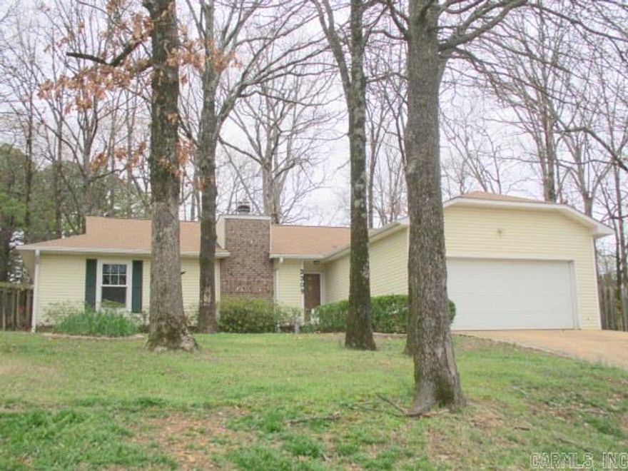 Cozy Home in an Established Neighborhood, Very Welcoming as soon as you enter the Front Door into the oversized Living Room and are surprised by the Open Living Room, Dining Room and Kitchen Area. The Brick Wood-Burning Fireplace is the Focal Point of the Living Room, and the Kitchen Features Walnut Cabinets, a Storage Island and Newer Appliances. The Split Bedroom Arrangement allows for larger bedroom areas. New Wood Laminate 2024, Attic Insulation New in 2023, Back Deck new 2019, Roof 2018, AC Updated 2017, Windows New 2014. Backyard is Fully Fenced.  Make an Appointment to see Today!!