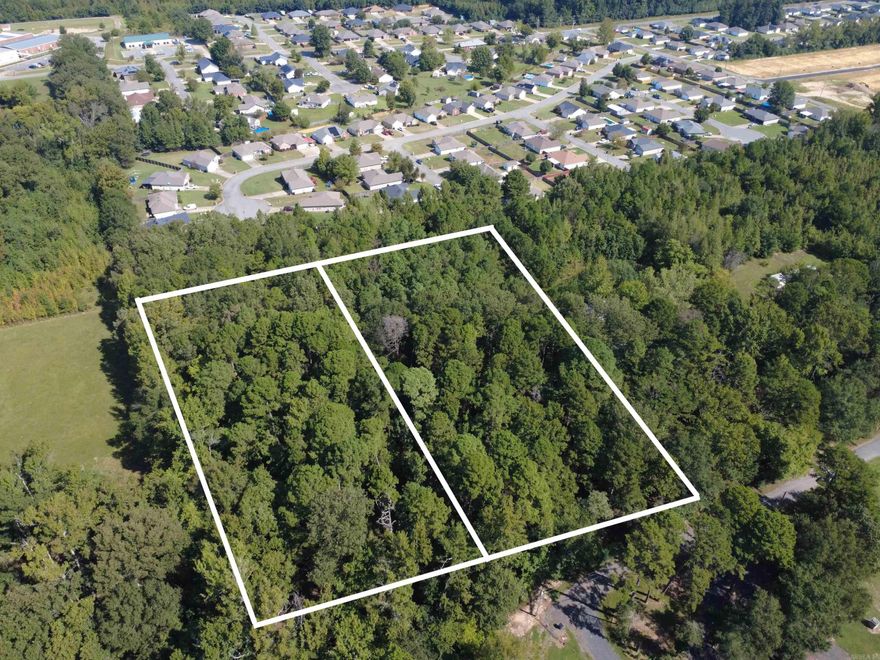 Two separate wooded lots in the culdasac of Margie Estates. Ready for a new living sight in a quiet, paved street inside Ward city limits. The lots have many mature trees that provide a secluded feel with plenty of privacy in all directions. First Electric provides electricity, and Ward provides city water and city sewer. Lots may be purchased separately, and both are priced exactly half of current asking price of both. Lot #6 measures approximately 190'x504', and lot #7 measures approximately 185'x501'.