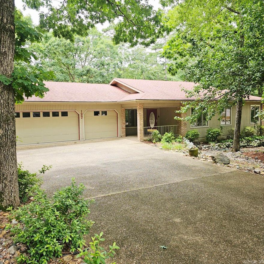 Golf Course Charm Meets Thoughtful Comfort – Ponce de Leon Living at Its Finest offered at $395,000-Perfectly positioned on the 16th green of Ponce de Leon Golf Course, this gracious 3-bedroom, 2.5-bath home offers serene views, smart design, and abundant space across approximately 2,454 sq. ft. of heated/cooled living. Inside, the open-concept floor plan creates easy flow between the combined dining and living area enhanced by a cozy brick gas fireplace and flooded with natural light from generous windows. Included is the refrigerator and counters with plenty of prep space in the large kitchen including a eat in area. Oversized laundry room, laundry tub, also includes the washer/dryer. A true retreat, the primary suite features impressive closet space and room to relax. Two versatile bonus rooms offer flexibility—perfect for sunrooms, home offices, or creative spaces. Beautiful wood flooring blends seamlessly with tasteful tile and carpet in select areas for a touch of comfort and character. Enjoy outdoor living on the expansive open deck.  Additional perks include: a workshop/safe room, spacious 3-car garage and fenced yard. Come see how truly special this home is.