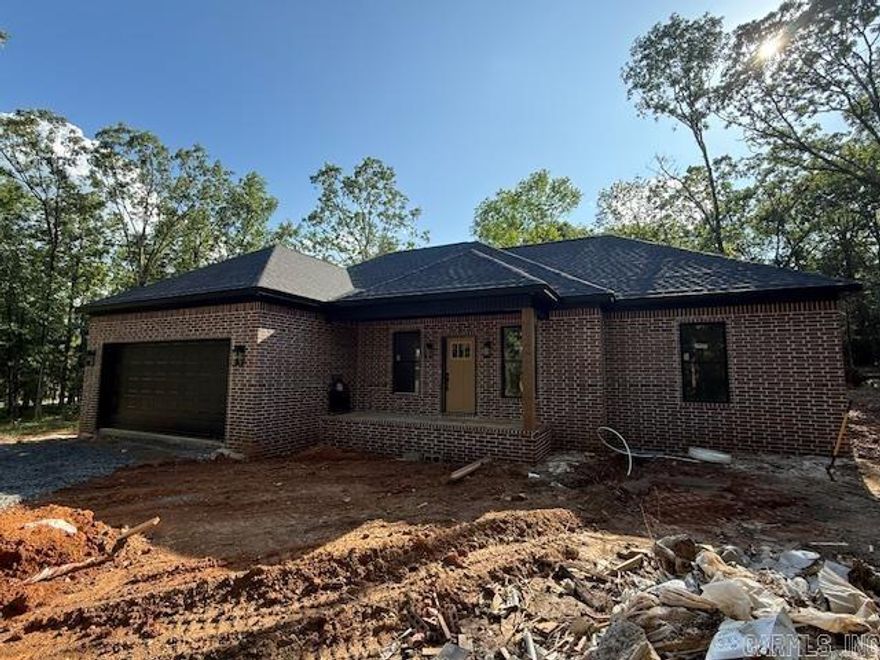 New Construction on 3 acres! This lot is deep and mostly wooded. Wilderness Road has very few homes and very little traffic. This home will have luxury vinyl throughout. Black handles, lighting and plumbing fixtures. Black stainless steel appliances.  Nice covered porch at the back to enjoy the wildlife sure to be seen in the yard. The house is set back from the road and has a nice private feeling nestled in the trees.