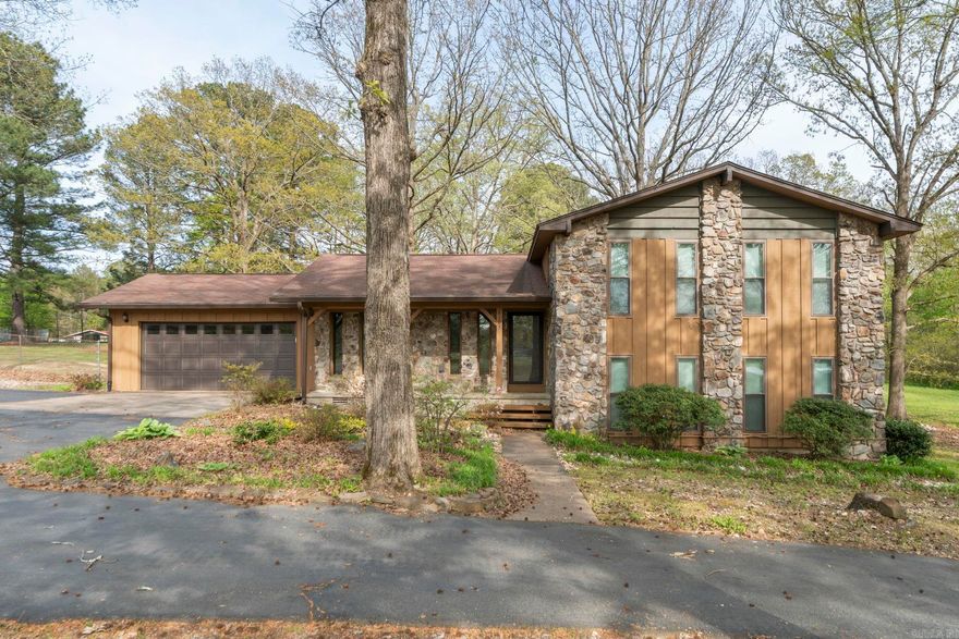 Welcome home to this charming 4-bedroom, 2.5-bath property nestled on 2.5 beautiful acres—offering the perfect blend of space and comfort. Three levels of living! 3 bedrooms and 2 baths on the 2nd floor and 1 bedroom and 1/2 bath in the basement with it's own living space. This home features multiple gathering areas including a cozy living room and a generous family room complete with a fireplace. Enjoy the natural light year-round in the inviting sunroom, or host get-togethers on the expansive attached deck and the large detached covered deck—ideal for outdoor entertaining in any season. Inside, you’ll find a separate dining area perfect for family meals and special occasions. The primary suite offers dual closets and an en-suite bathroom featuring a large walk-in shower. Additional highlights include an attached garage, circle drive and plenty of room to roam, garden, or simply enjoy the peaceful surroundings. With its charm, versatile layout, and ample outdoor space, this property is a rare find you won’t want to miss! No seller property disclosure available. Buyers to verify lot size and home square footage using their own measurements. Some photos have been virtually staged.