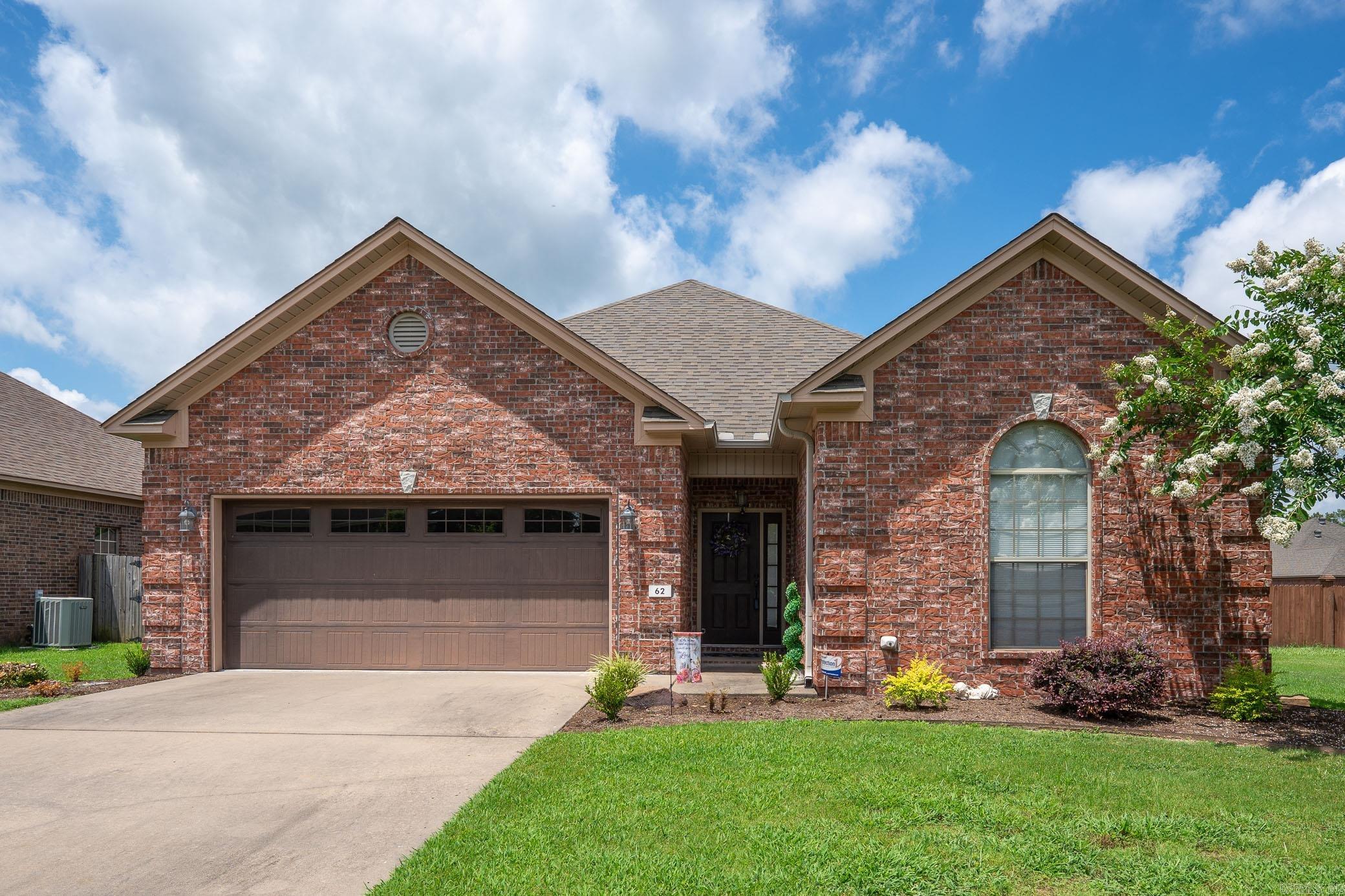 Beautiful All-Brick Home on Spacious Double Lot! This well-maintained home sits on a rare double lot with a huge fully fenced backyardāperfect for outdoor living, pets, and entertaining. Inside, you'll find a warm and inviting layout featuring rich laminate flooring, elegant crown molding, and a cozy gas fireplace as the centerpiece of the living room. The kitchen boasts stained wood cabinetry, stainless steel appliances, ample counter space, and a functional layout ideal for any home chef. With a 2-car garage, generator, fresh landscaping, and great curb appeal, this home offers comfort, space, and style in a desirable neighborhood. Conveniently located near shopping, dining, and schools, this home is move-in ready and full of charm! Don't miss this opportunity!