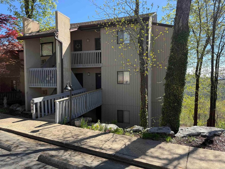 LAKEVIEW Garden level  located in Cliffside condo complex. This condo has a view of Greers Ferry lake and the mountain vista. Beautifully updated kitchen with granite counter tops, stainless steel appliances, and has engineered wood and tile flooring throughout.  Be sure to notice the custom sun-filtering shades that easily adjust!!  Two large bedrooms that will accommodate King beds or 2 Queens, 2 bathrooms.  Enjoy the fireplace on the cool evenings, and also the rear deck with a fabulous view! This condo can be your perfect lake getaway, or to use as a short-term rental property.  Located close to the cool pool, tennis courts, pickleball courts, mini golf, bowling, golf, hiking trails, four-wheeler trails and so much more. Call today for your private tour.  Furniture is not included, but some items could be purchased.  Also included in your purchase is a lot behind the condo to allow you to maintain your  view as desired!!!  Agent Remarks