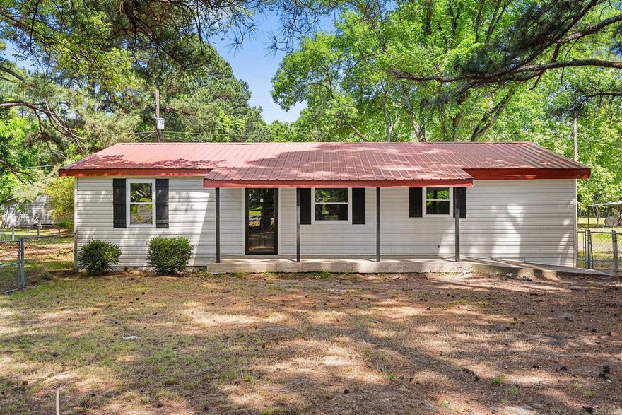 Homes like this don’t hit the market often! If you’ve been searching for an updated home on acreage outside city limits, this is the one you’ve been waiting for. Situated on 1.17 acres, this newly remodeled 3 bedroom, 1.5 bath home offers the perfect blend of modern updates and peaceful country living. Inside you’ll find durable LVP flooring throughout with no carpet, a spacious living area with LED lighting, and generously sized bedrooms. The large kitchen and dining area is ideal for entertaining and features butcher block countertops, subway tile backsplash, and newer stainless steel stove and dishwasher. Both bathrooms have been beautifully updated, including a primary bath with double vanity. Enjoy the space, privacy, and flexibility that acreage living provides while still being conveniently located to nearby amenities. Move-in ready and packed with updates—schedule your showing today!