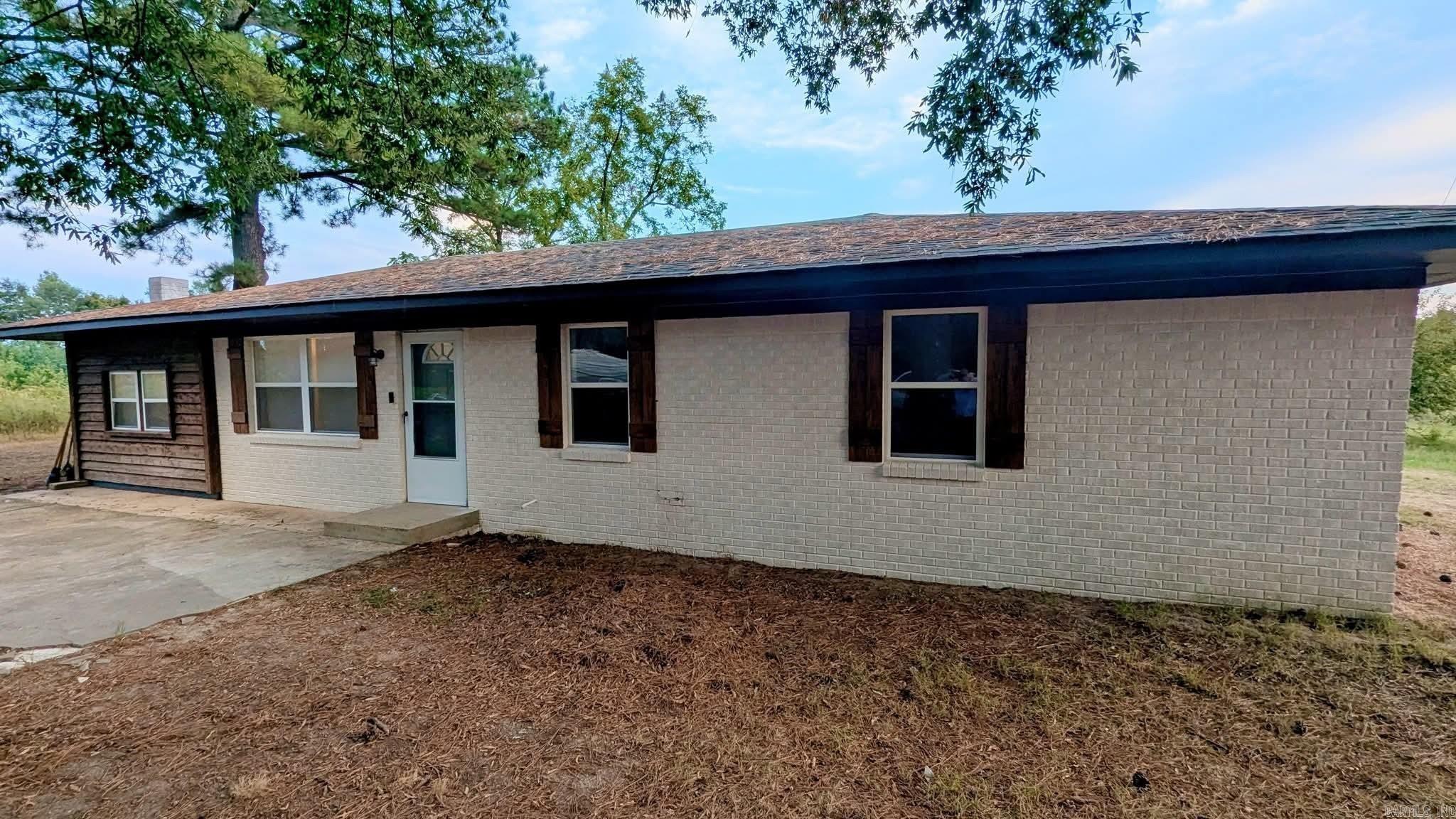 Beautifully Updated Home in 2023. Located on a 0.50+/- this charming property offers modern updates and plenty of room to live, work, and play. New roof, HVAC system, and water heater installed in 2023. Windows replaced 2023. Large 24x40 shop with electric ideal for hobbies, storage, or workspace. 18x20 carport provides covered parking. Gorgeous luxury vinyl flooring throughout the home. Septic lines currently being updated for peace of mind. All electric utilities for efficient living. This home combines comfort, functionality, and style all in a country setting.