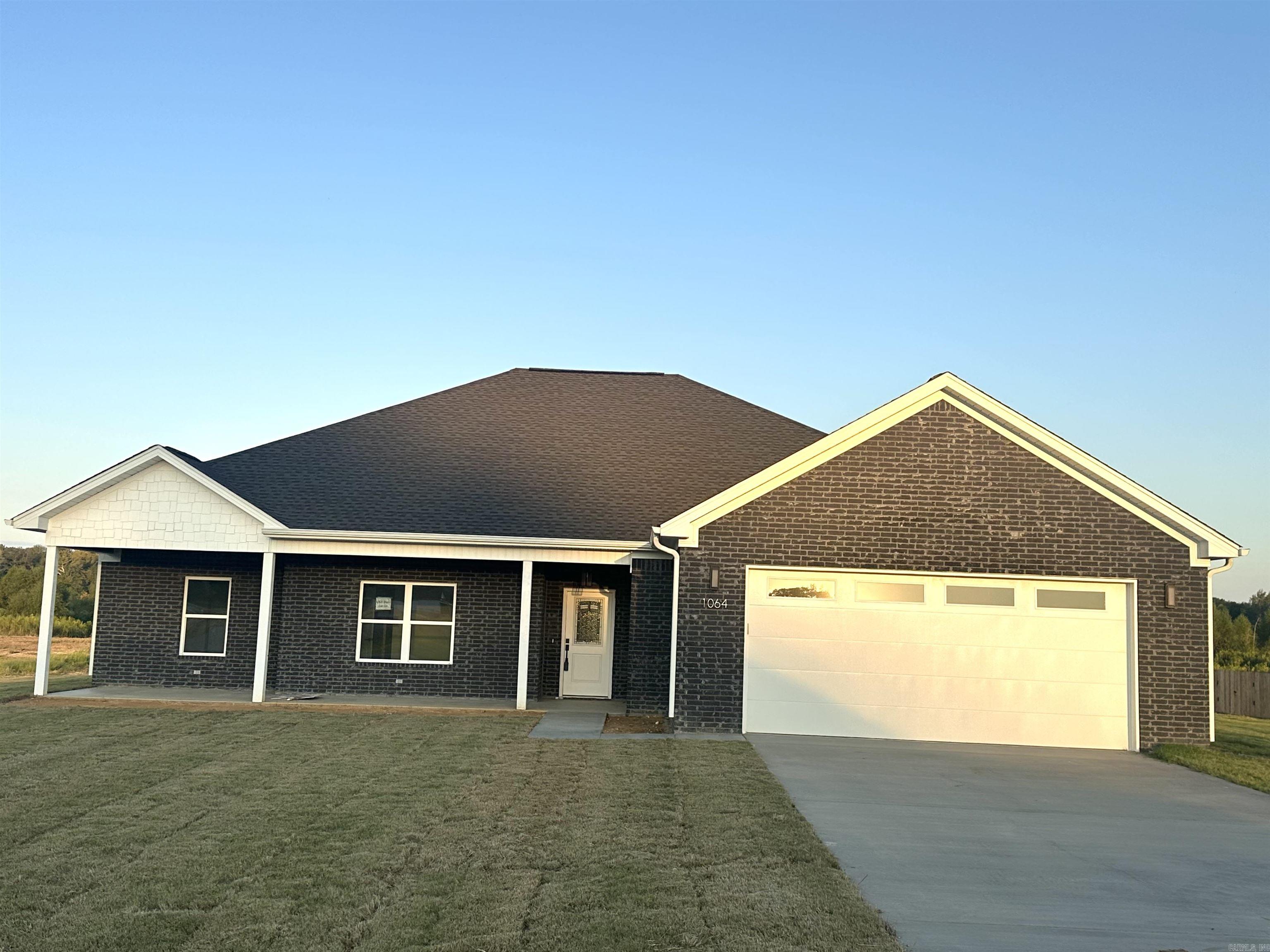Experience serene living in this charming 4-bedroom, 2- bathroom home located in Winchester Estates Subdivision. This charming new construction sits on 1.36 acres backing up to tranquil woods where you can enjoy watching the wildlife from your back porch. Home features an open floor plan, walk-in pantry, and ss appliances. Stepping into the primary suite, you'll find his-and-hers walk-in closets, tile walk-in shower and soaking tub. Bauxite school District!! $5000 BUILDER INCENTIVE WITH AN ACCEPTABLE OFFER!!