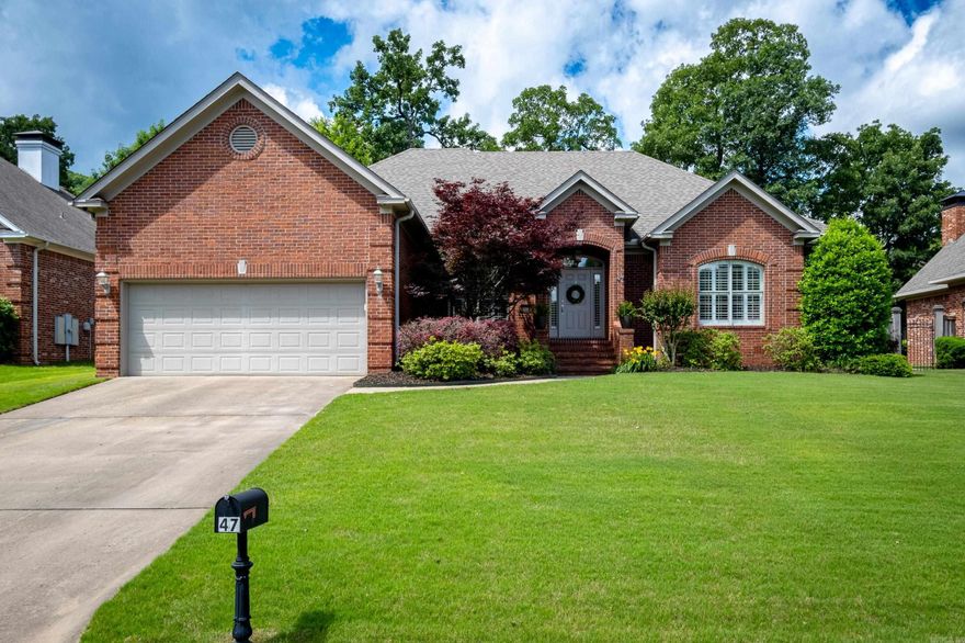 Gorgeous and pristine updated one level with 3 bedrooms with a split floorplan, 2.5 bathrooms plus an office and formal dining room! This immaculate property features plantation shutters along the front of the house, beautiful hardwood flooring, new light fixtures and decorator-designed built-ins in the living room and gas log fireplace. Kitchen has granite slab counters, stainless appliances, double ovens, built-in microwave, gas range, pantry, breakfast area and bar. Primary bedroom suite sits apart from other rooms and has double sinks, tub, shower, walk-in closet and water closet. Two extra bedrooms are connected by a full bath. Fully fenced backyard has nice deck overlooking the landscaped yard. All window treatments and refrigerator convey. Roof 2017. Water heater 2019. Two car garage. Front/back sprinkler system. Large, floored attic above garage. See remarks.